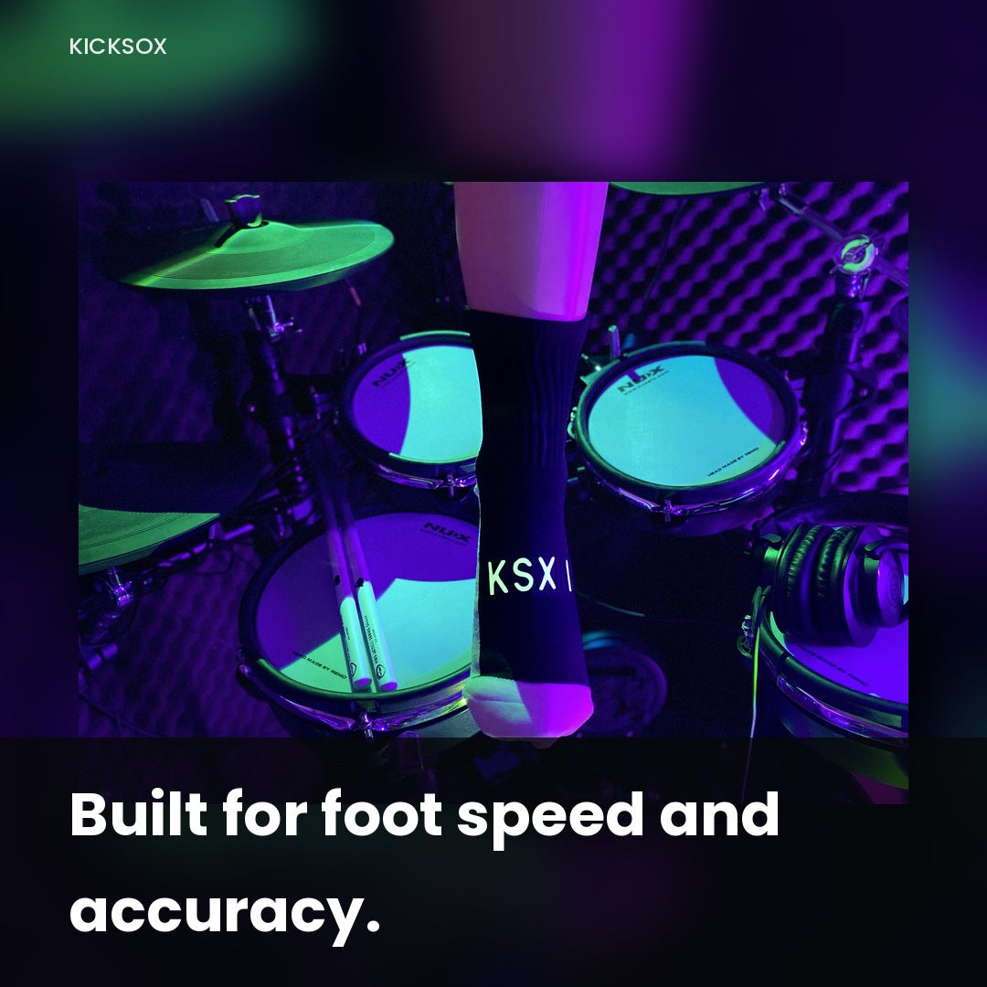 Drummer wearing a black KickSox sock at an electronic drum kit, built for foot speed and accuracy